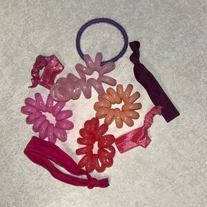 Group of pink/purple hair ties